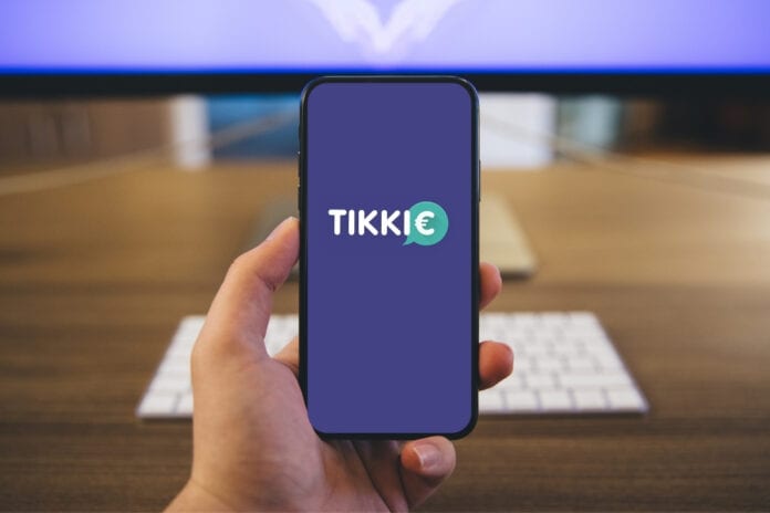 Photo-of-phone-in-hand-with-Tikkie-app-open-the-Netherlands