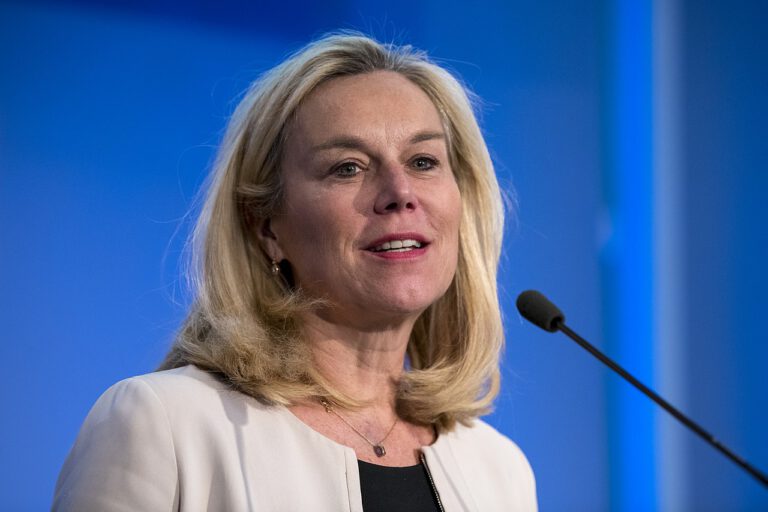 Dutch minister confronted by demonstrators with flaming torches
