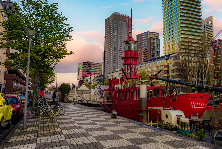 A-bright-red-ship-parked-in-a-canal-in-Rotterdam