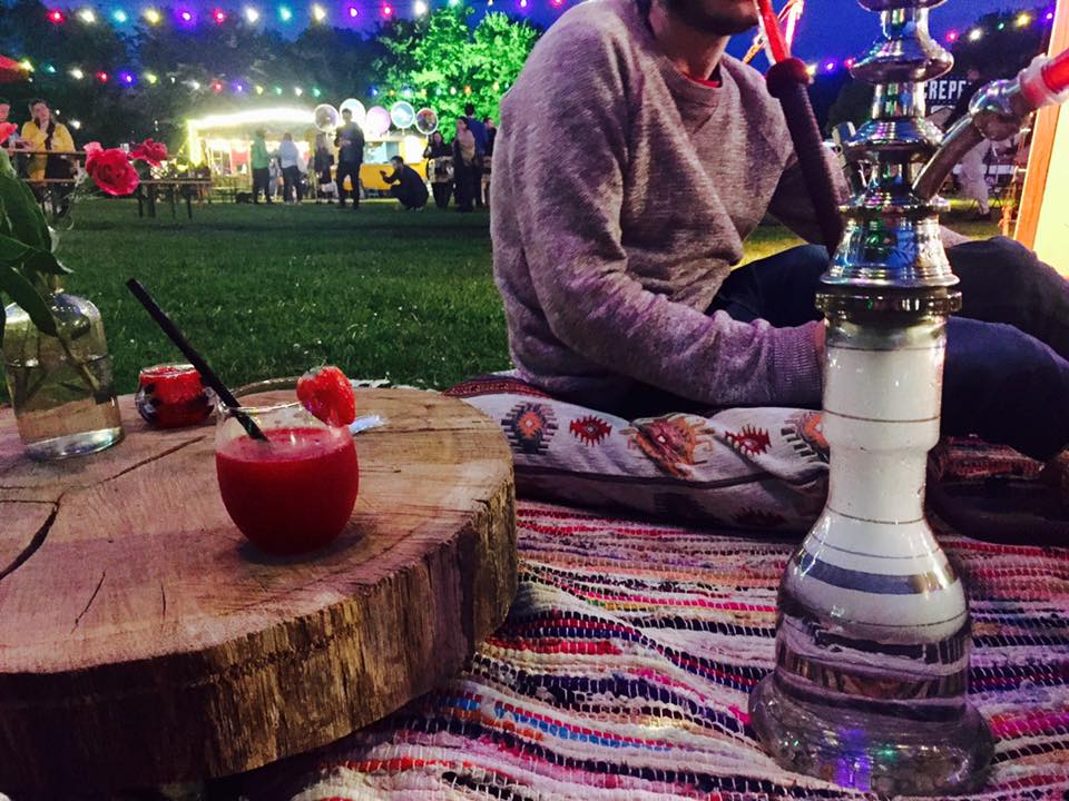 A-visitor-of-festival-TREK-in-Rotterdam-enjoying-a-Shisha-pipe