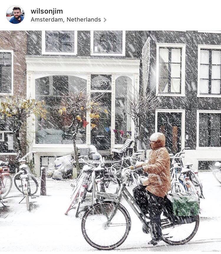 instagram-post-of-a-woman-biking-in-the-snow-in-Amsterdam