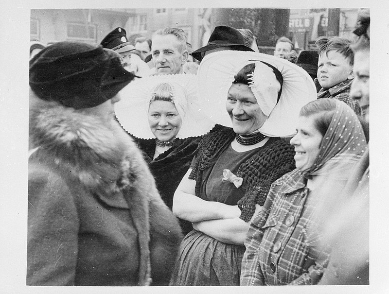 The Queen speaking to locals, 1945