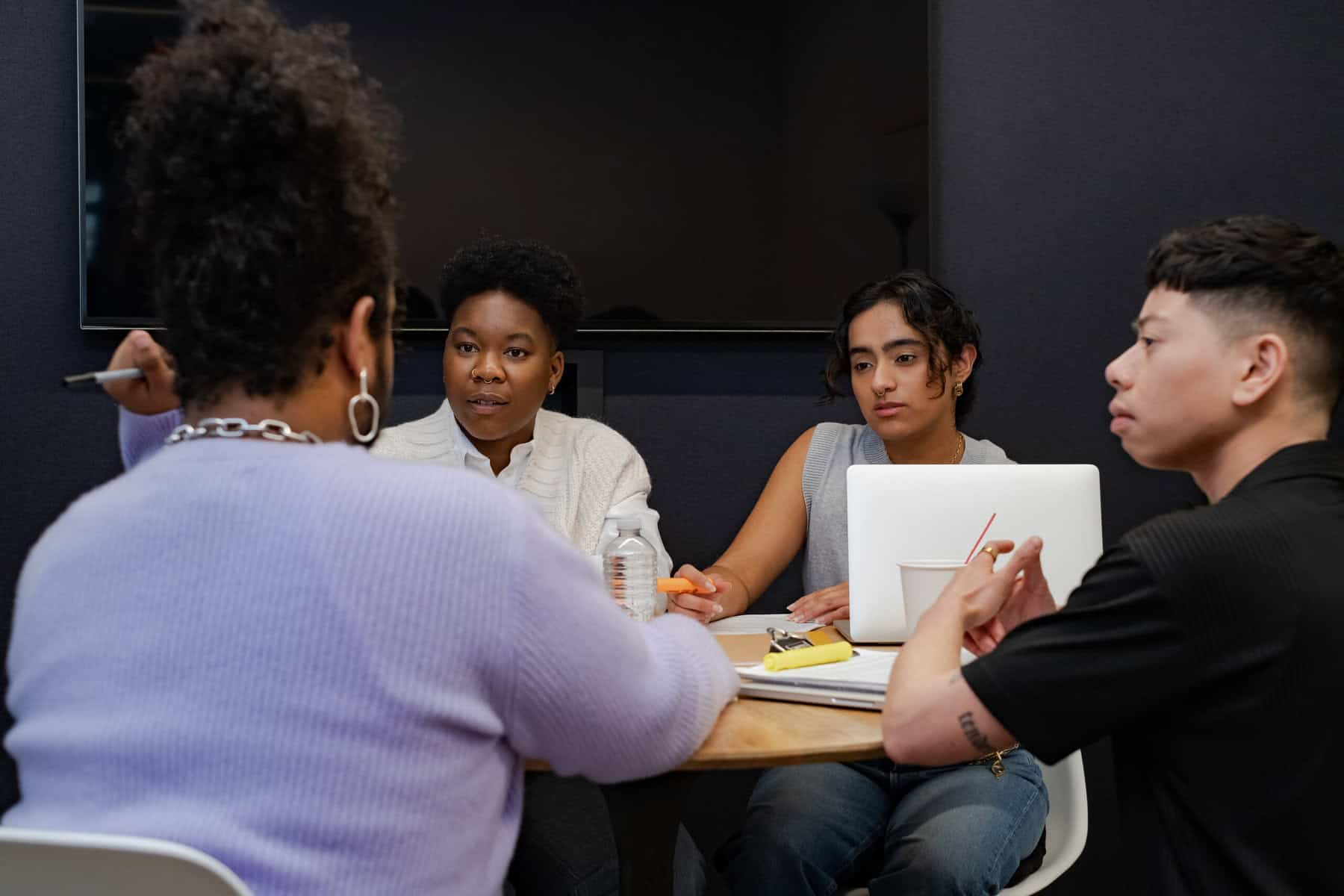 photo-of-non-binary-person-discussing-gender-affirming-surgery-with-their-gender-team-at-dutch-gender-clinic