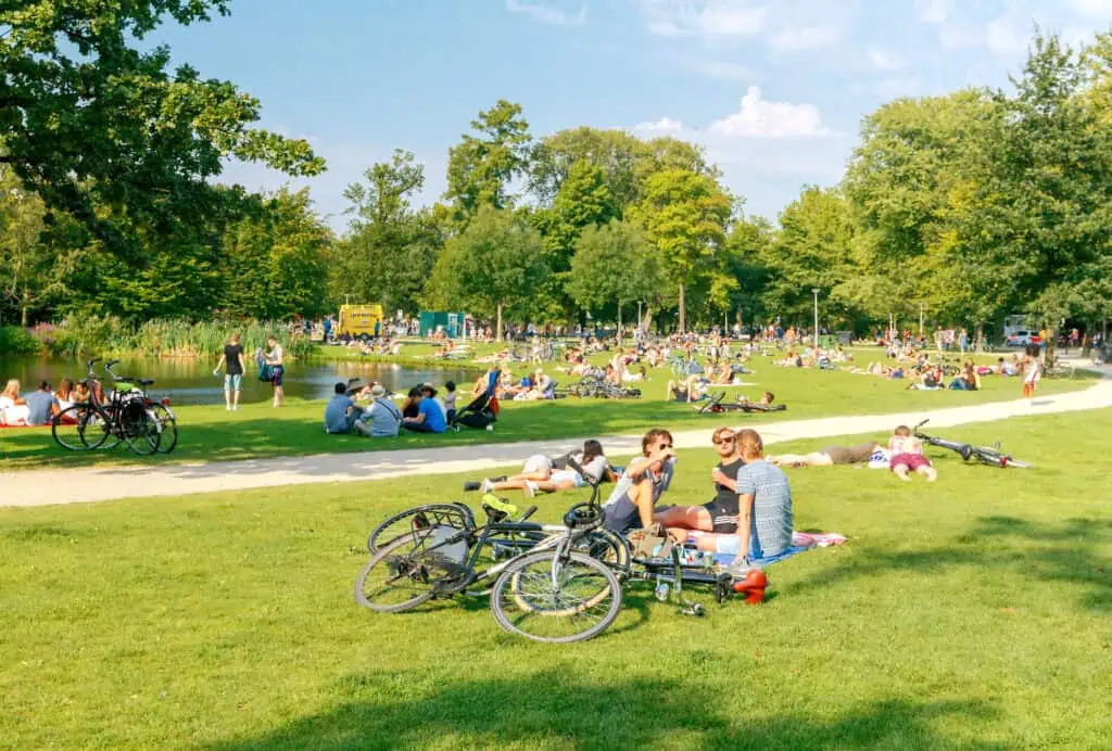 A-photo-of-a-group-of-Dutch-friends-enjoying-the-sun-in-Vondelpark-Amsterdam