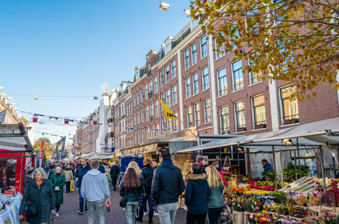 Photo-of-people-strolling-along-Albert-Cuyp-Market-in-de-pijp-Amsterdam