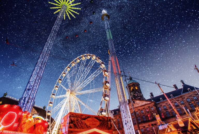 photo-of-starry-night-sky-over-funfair-on-dam-square-in-amsterdam