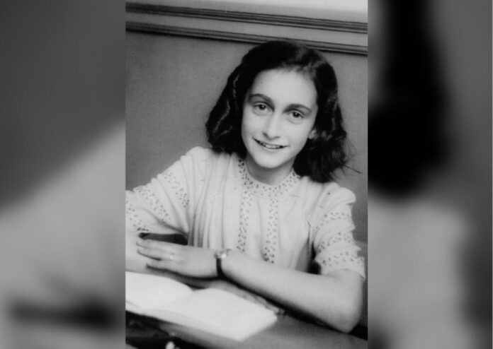 Photograph-of-young-Anne-Frank-smiling-into-camera