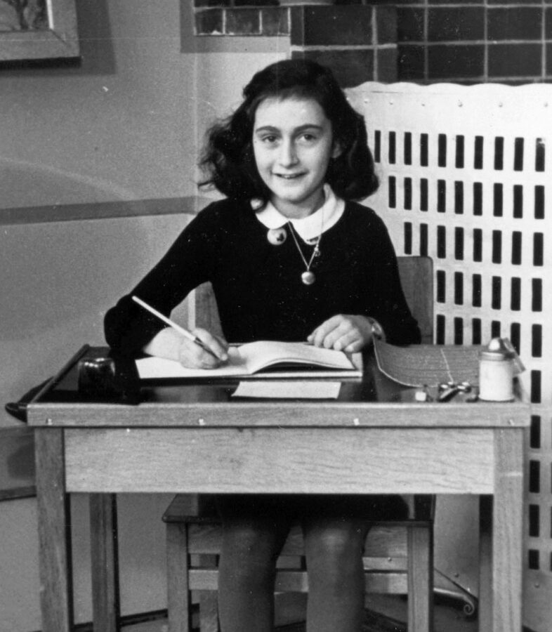 Anne-Frank-writing-in-her-diary-about-being-a-Dutch-Jewish-woman-during-WWII