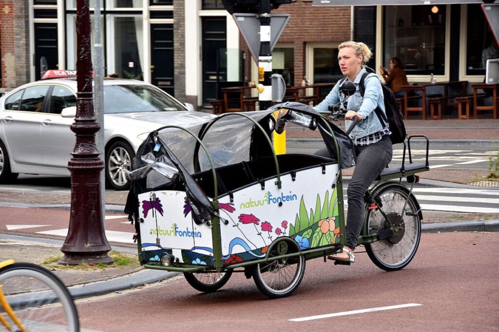 photo-of-woman-on-bakfiets-the-Netherlands