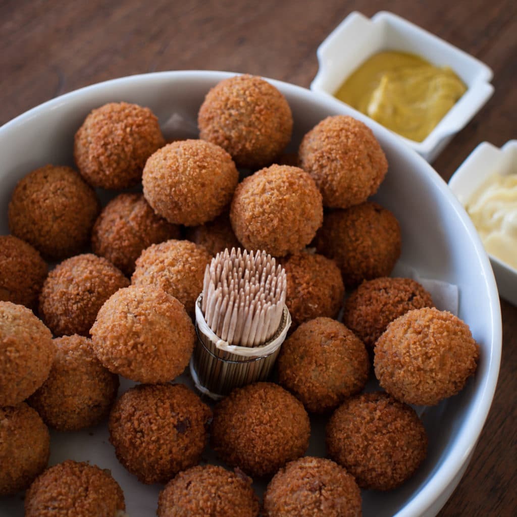 Dutch-delicasy-bitterballen-on-a-table-with-mustard-mayo