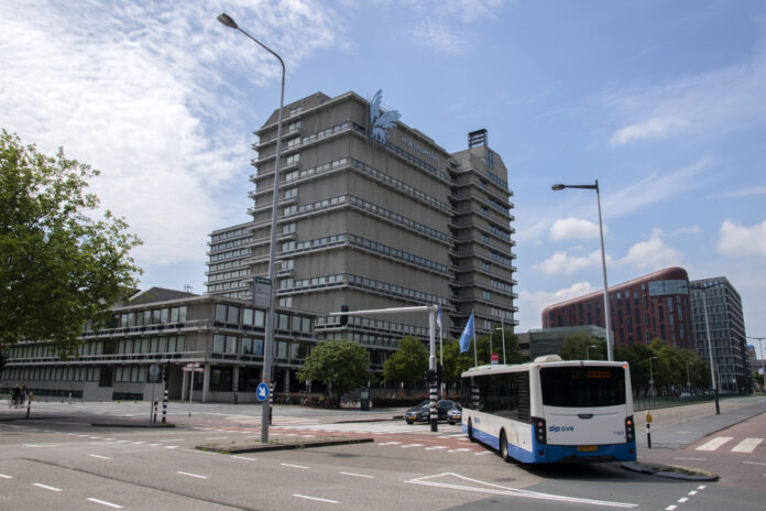 Bus-passing-by-building-of-the-Vrije-Universiteit-in-Amsterdam