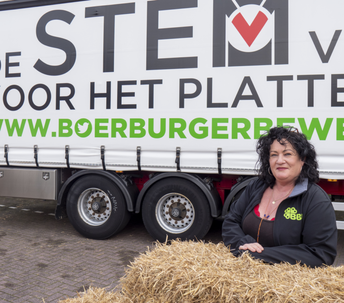party-leader-of-the-farmer-citizen-movement-caroline-van-der-plas-in-front-of-promotional-material