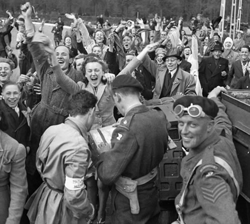 The Netherlands at war: Dutch citizens and Canadian soldiers celebrating liberation