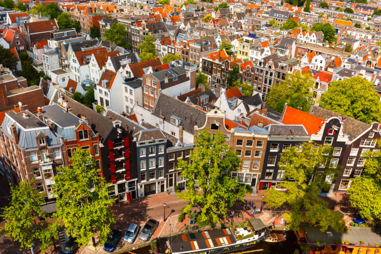 Amsterdam-city-view-rows-of-houses-cost-of-living-in-Amsterdam-the-Netherlands