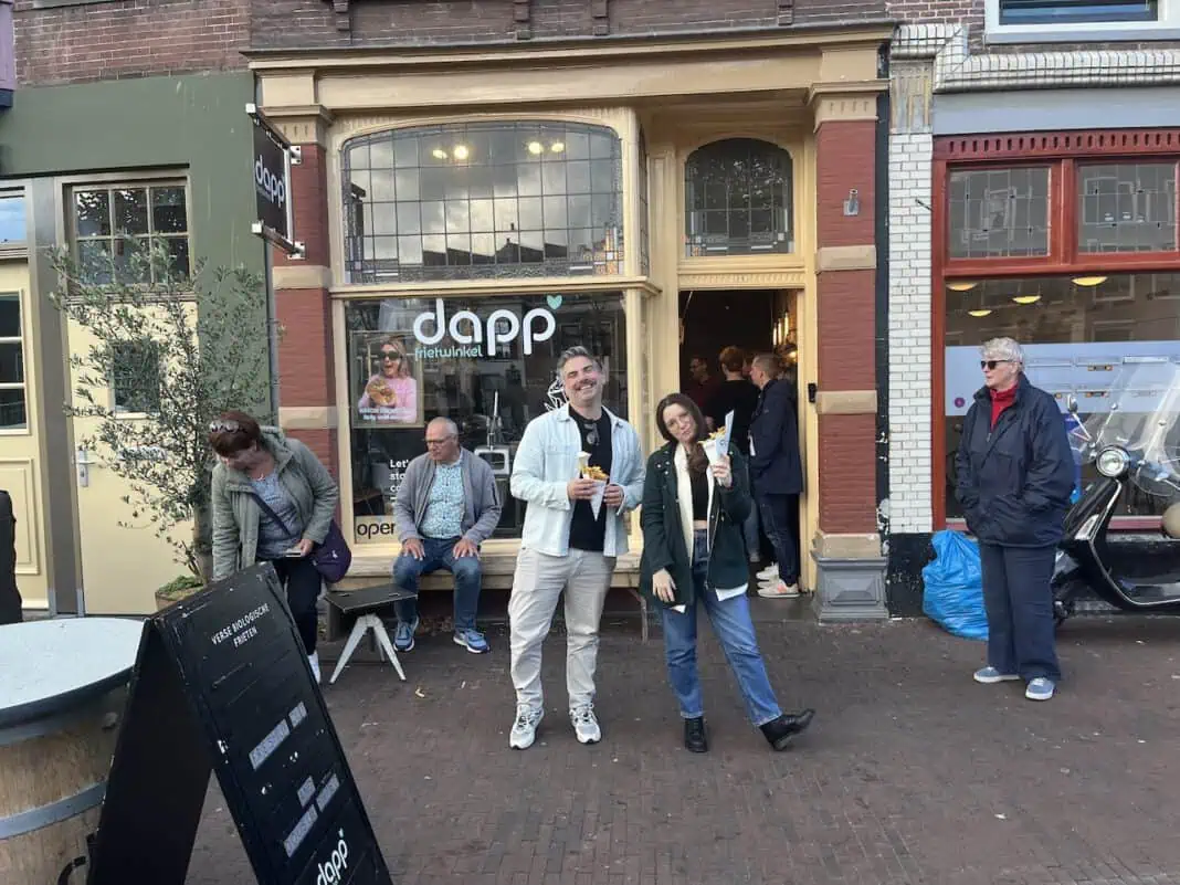 photo-of-man-and-woman-outside-dapp-friet-winkel-in--Leiden-with-best-fries-in-the-world