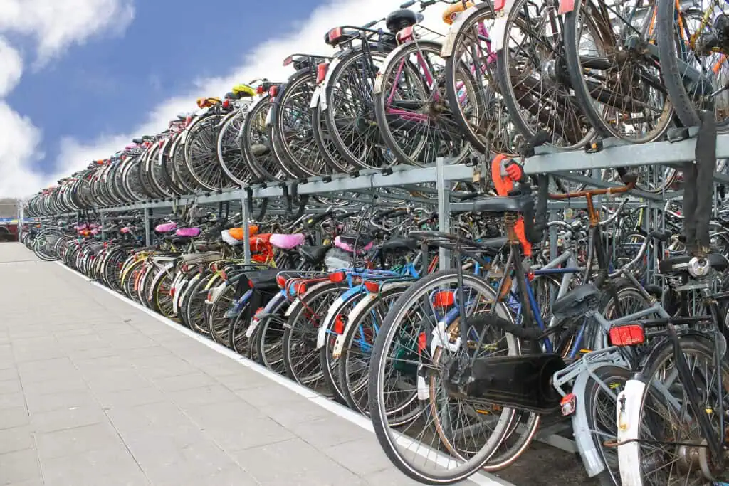 photo-line-of-bikes-parked-busy-bike-park-two-compartments-top-parking