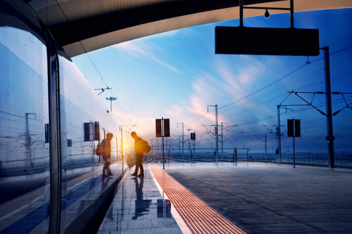 Train-stop-at-station-early-morning-at-sunrise