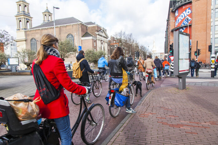 Photo-of-cyclists-in-Amsterdam-waiting-at-red-light