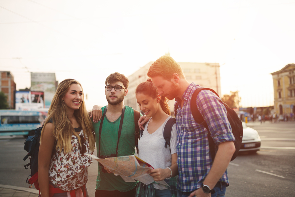 group-of-young-friends-travelling-by-train