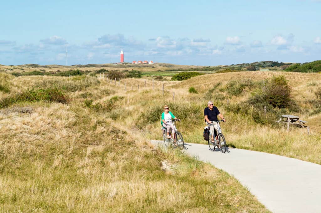 photo-of-an-elderly-couple-riding-bikes-in-Texel