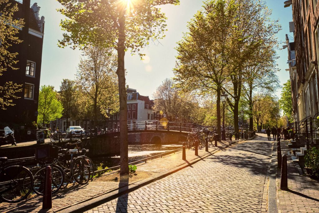 photo-of-a-canal-in-amsterdam-on-a-sunny-day
