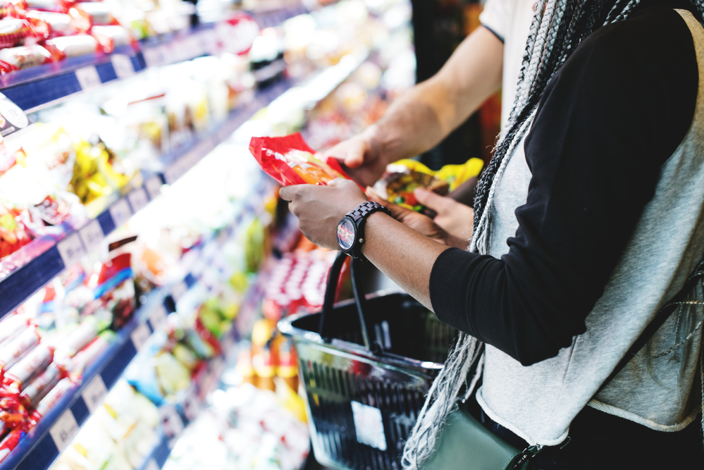 Two-people-getting-an-item-from-free-supermarket-in-Amsterdam