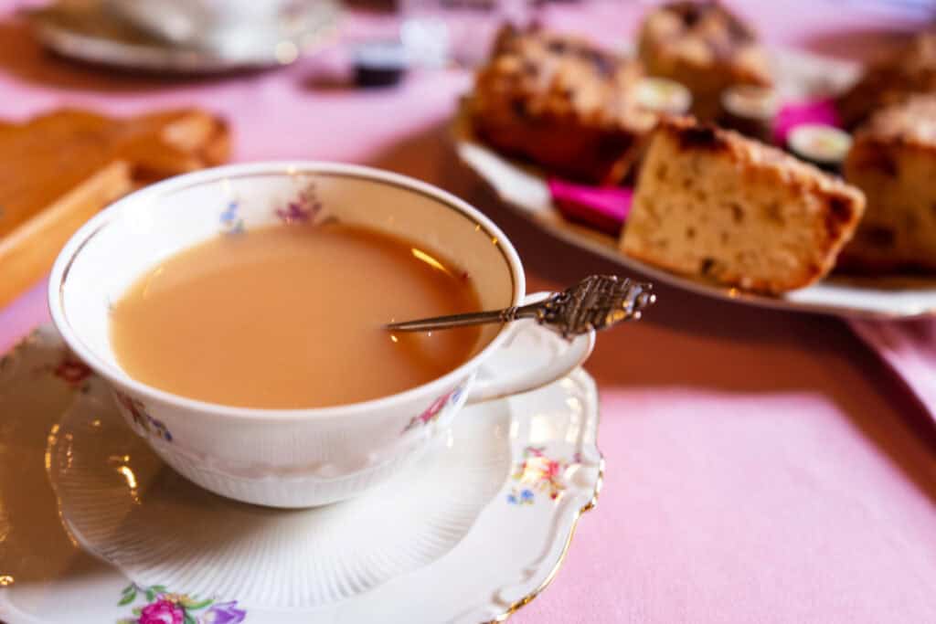 photo-of-the-perfect-cup-of-tea-with-tea-cake-in-the-foreground