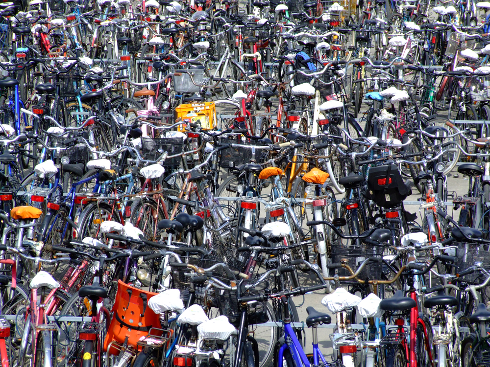 photo-of-an-endless-number-of-bicycles-parked-all-together-in-a-crowded-space