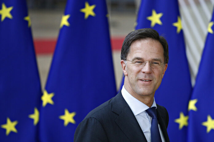 Photo-of-Rutte-with-EU-flag-behind-him
