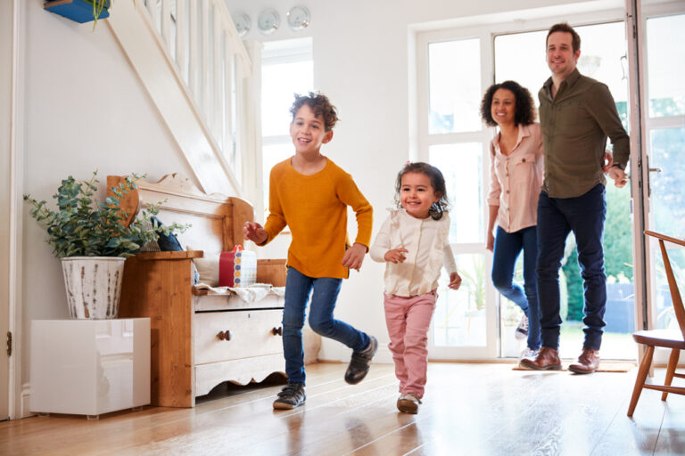 Photo-of-family-walking-into-house-in-Netherlandsds