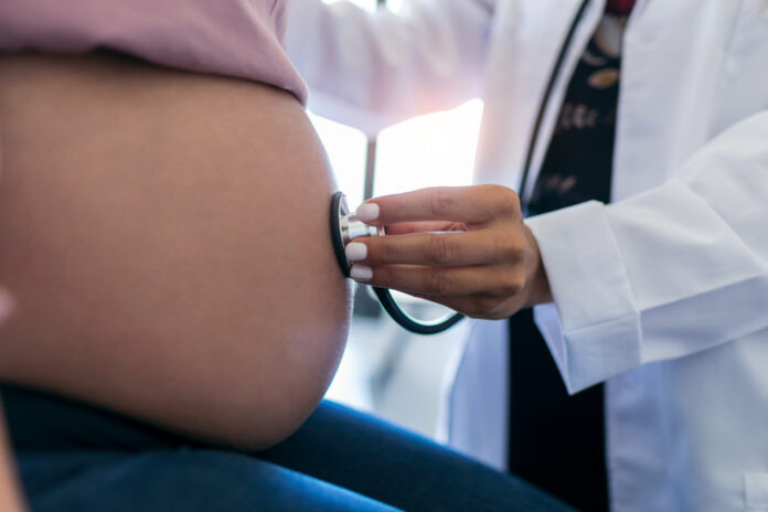Photo-of-pregnant-woman-getting-heartbeat-checked-by-gynaecologist-Netherlands