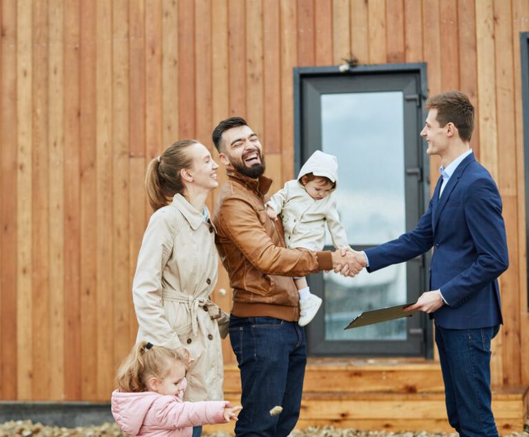 Photo-of-family-shaking-hands-with-Dutch-realtor-after-buying-a-house-in-the-Netherlands