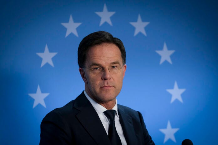 Dutch-prime-minister-mark-rutte-in-front-of-EU-flag