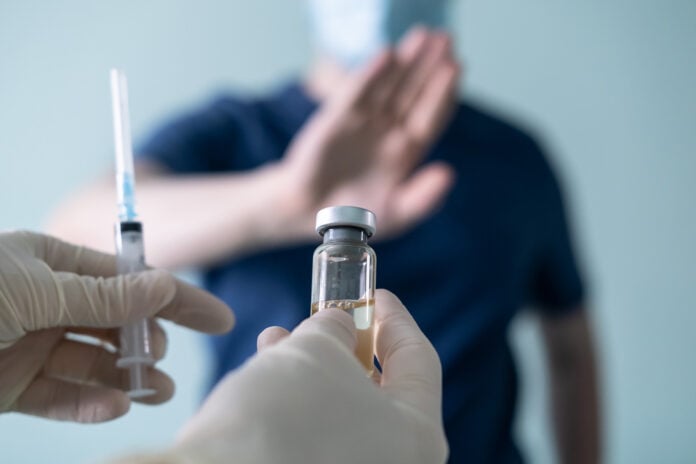 Anonymous-man-shown-refusing-coronavirus-vaccine-shot
