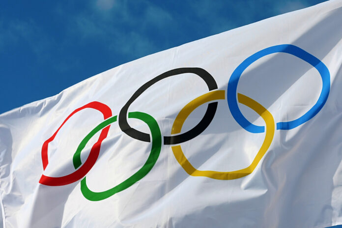 olympic-flag-against-blue-sky