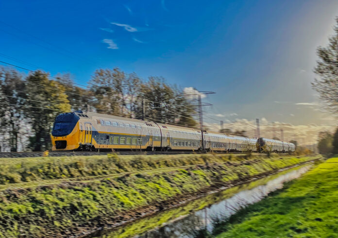 NS-train-zooming-through-Dutch-landscape
