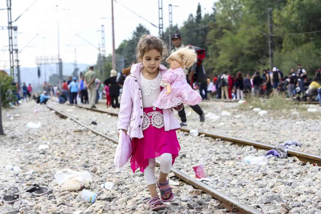 Picture-of-a-little-girl-waling-in-a-refugee-camp