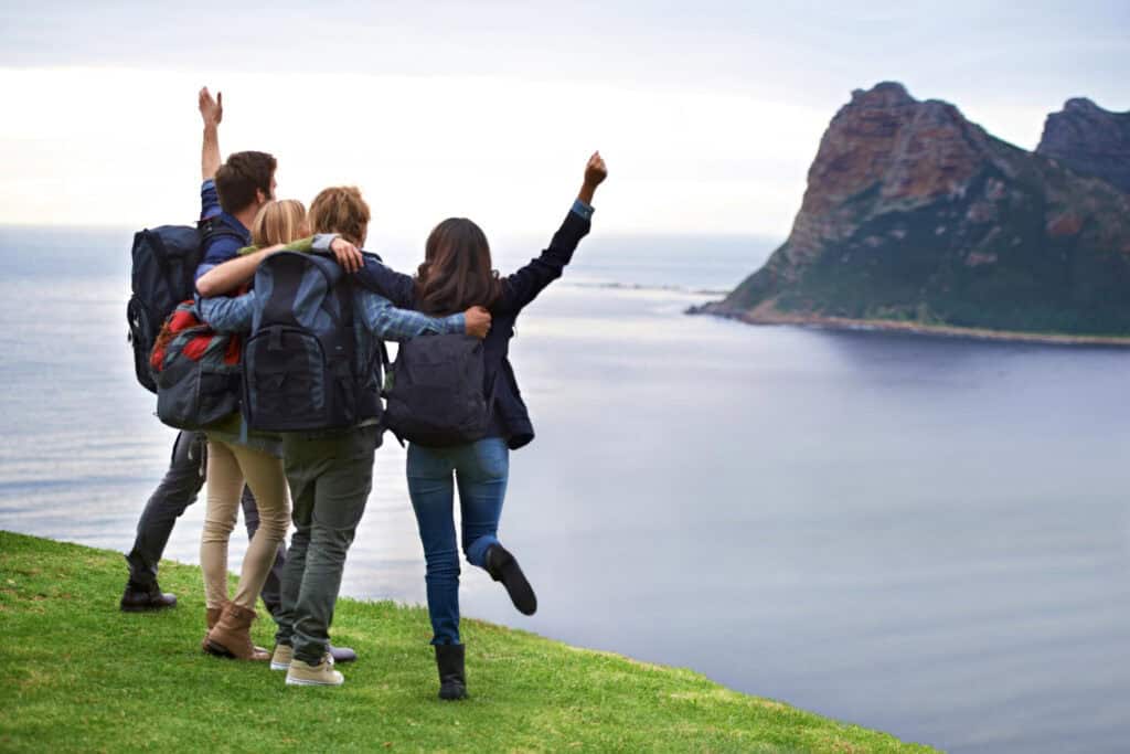 photo-of-group-of-friends-celebrating-together-while-travelling-with-Dutch-travel-insurance
