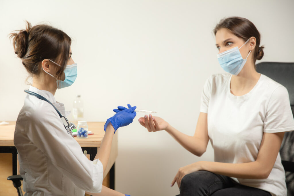 doctor-giving-patient-needle