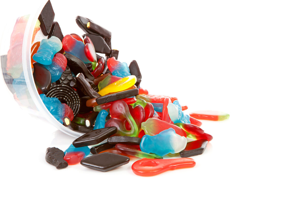 Trying drops. Sweets isolated.