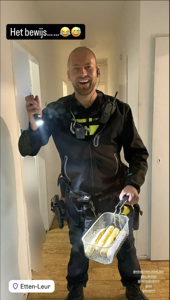 photo-of-police-man-holding-frikandels-in-fryer-after-break-in