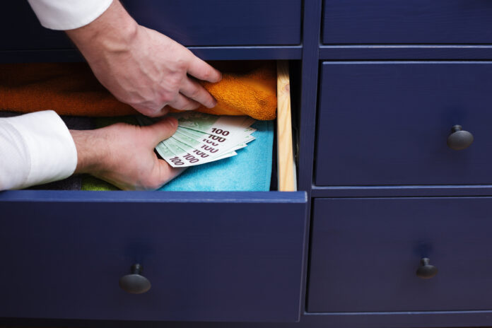 Dutch man hiding a large sum of money in his cupboard