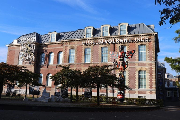 A huge totem pole greets visitors entering the Museum Volkenkunde