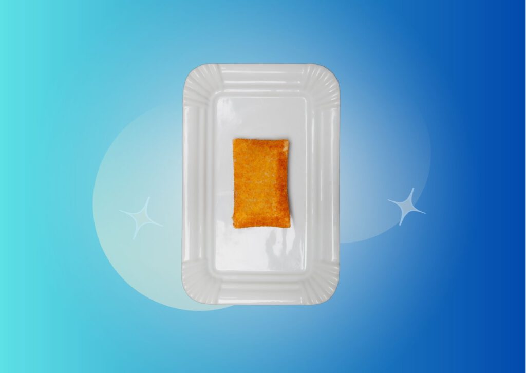 dutch-febo-snack-kaassouffle-vertically-placed-on-white-paper-plate-against-blue-gradient-background
