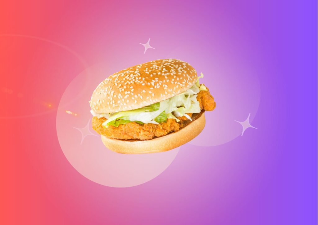 chicken-burger-with-lettuce-and-mayonnaise-against-gradient-red-to-purple-background