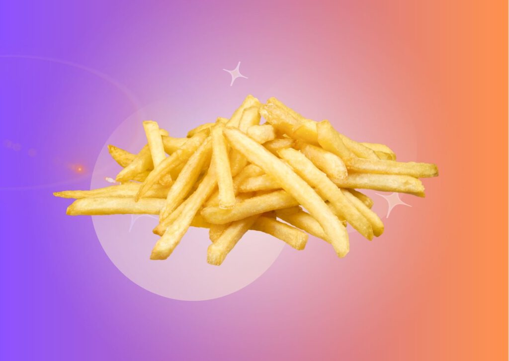 pile-of-french-fries-against-peach-to-indigo-gradient-background