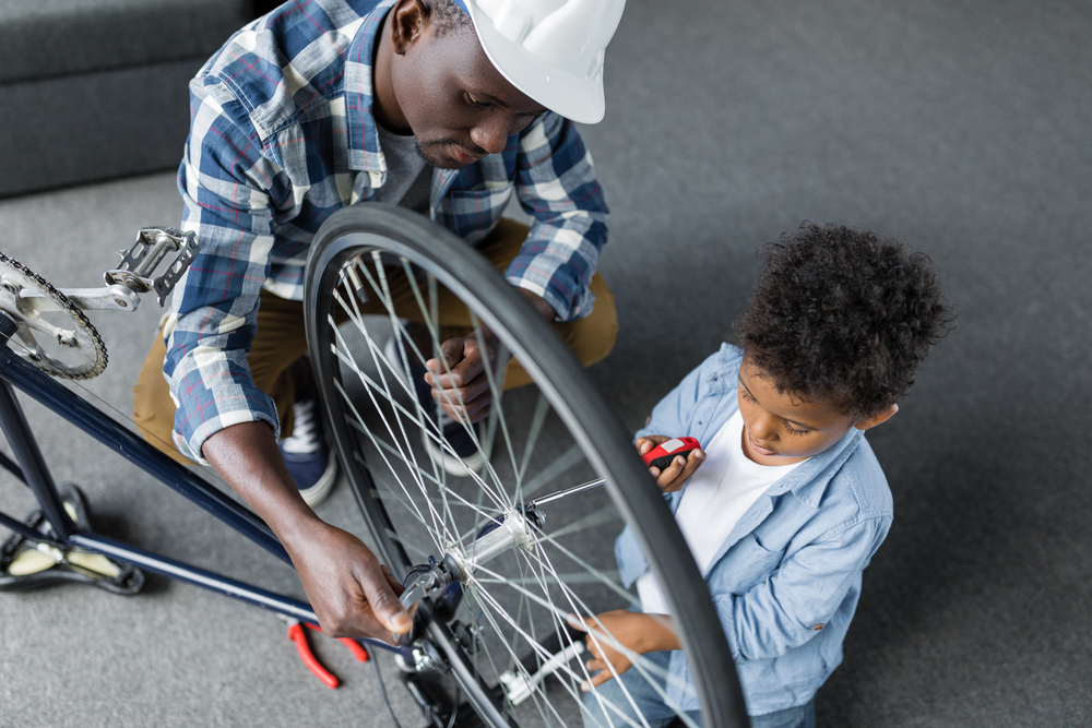 father-and-son-reapiring-broken-bike-how-to-use-bike-like-dutchie