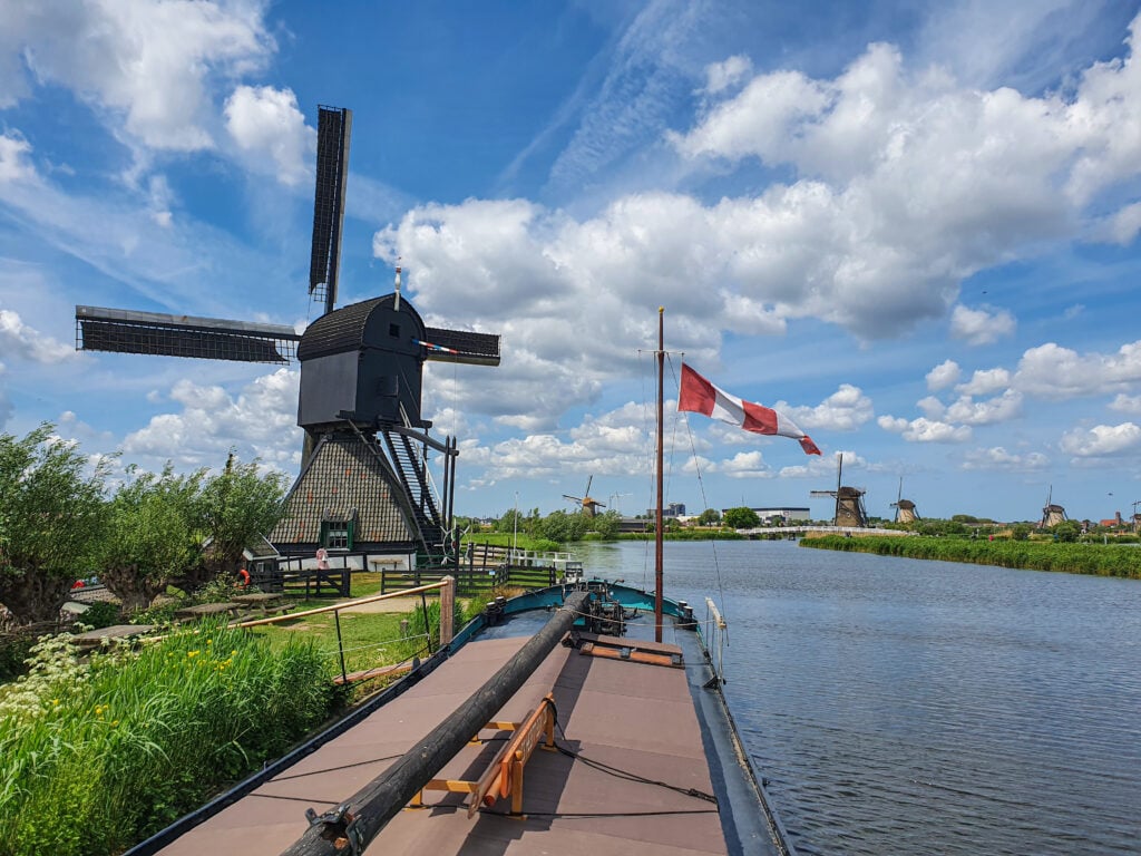 view of the windmills from the floating exhibition in kinderdijk things to do