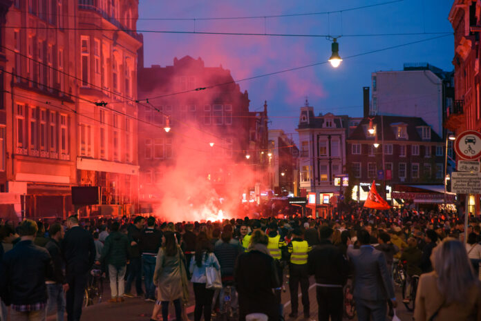 Photo-of-football-riots-in-Amsterdam-city-centres-with-lots-of-fireworks-police-and-people-around