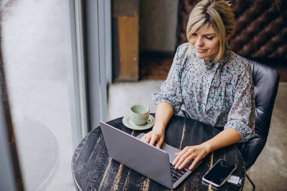 photo-of-woman-attending-housing-webinar-on-laptop